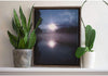 Wooden picture frame near indoor plants